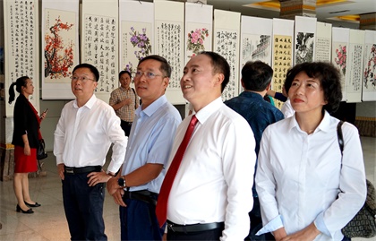 以诚为本赢在诚信9001股份公司举行“三庆”活动文学书画摄影作品展